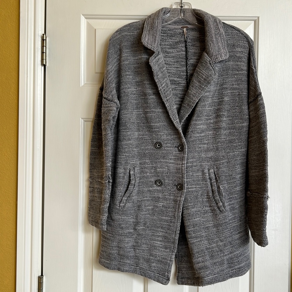 Free people sweater may fit small / med / large not oversized